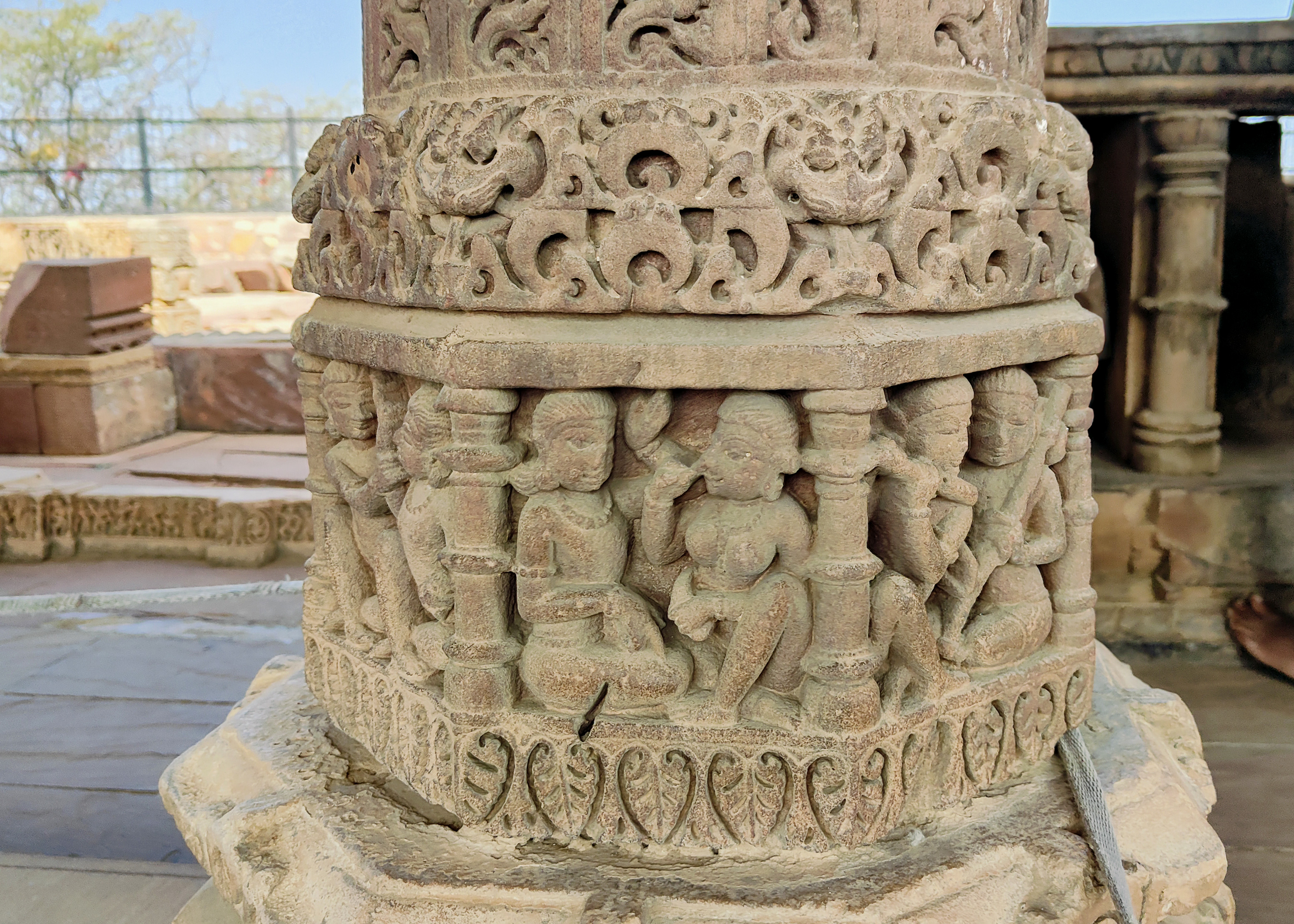 The Harshnath Temple's mandapa's pillars lack uniformity and might have undergone replacements at a later time. The niches on this pillar do not feature any images of goddesses. Instead, it displays a panel of musicians and dancers.