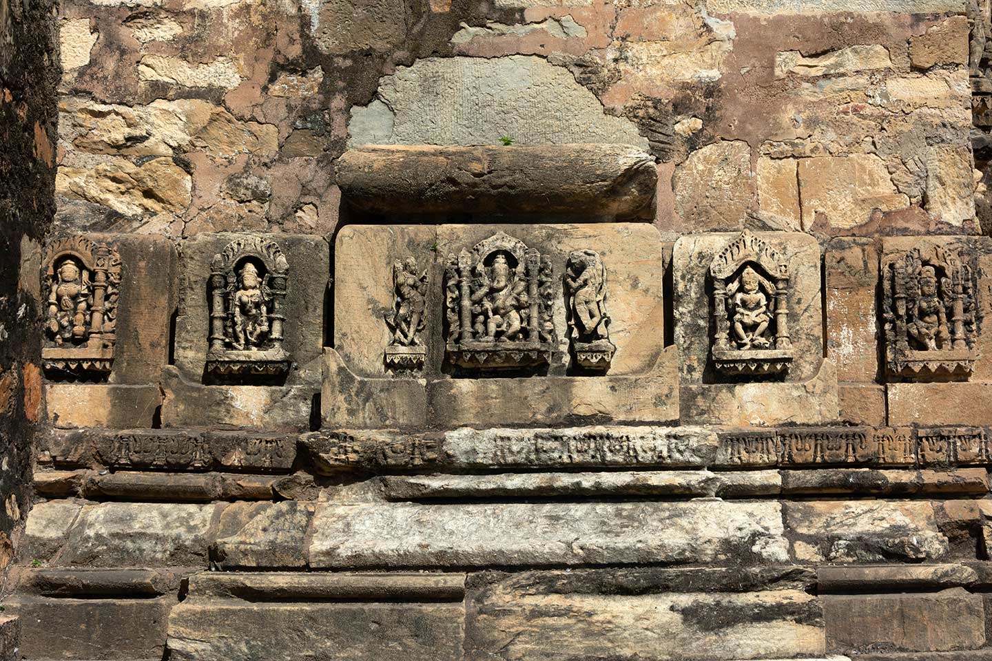 Image 4: Ganesha sculpture on the kumbha moulding that corresponds to the bhadra (central projection) of the north lateral shrine in the Neelkanth Mahadev Temple complex.