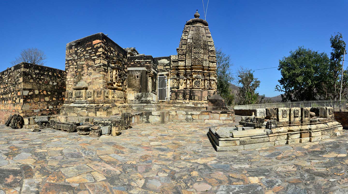 This is a view of the Neelkanth Mahadev Temple, seen from its southeastern corner. The temple's southern and eastern shrines, seen from the rear, are also pictured here. The western side of the temple is its principal entrance, and the eastern shrine has a partially preserved and conserved shrine.