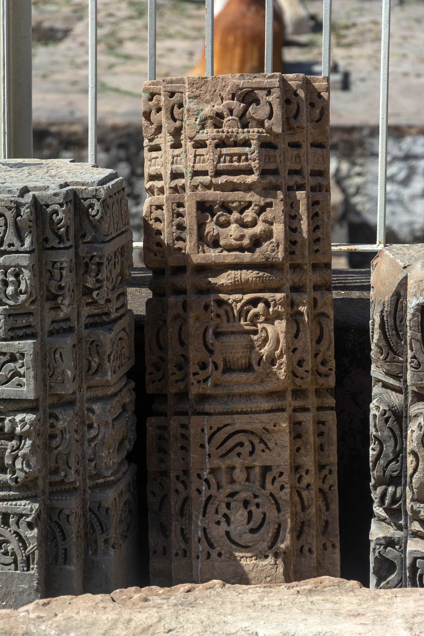 The area surrounding the Neelkanth Mahadev Temple contains the remains of pilasters. The original position is not known, but these are stylistically similar to the interior of Neelkanth Mahadev Temple. The pillar shaft has a ghatapallava (pot with foliage) motif.