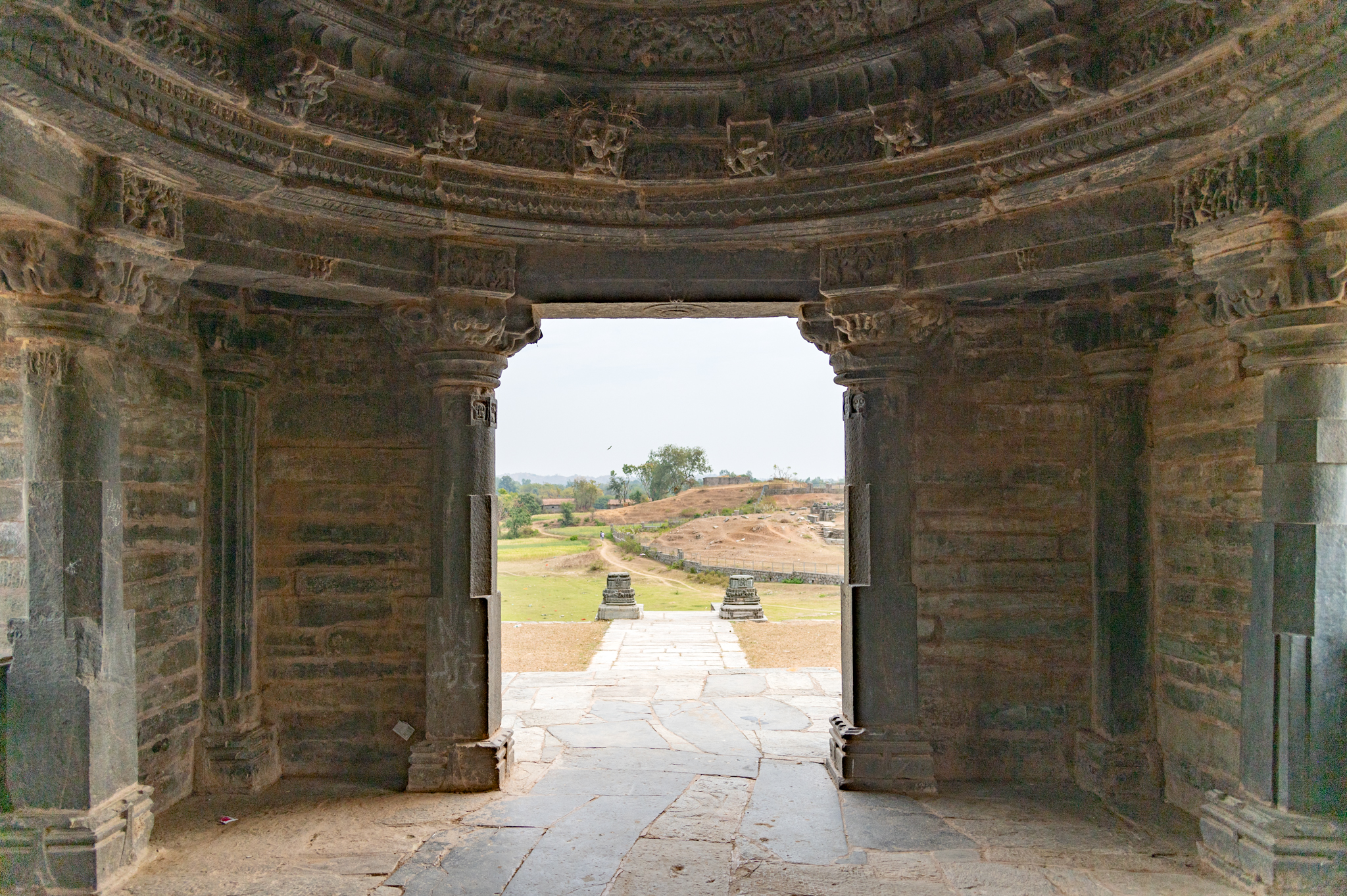 Someshwar Mahadev temple's mandapa is astylar, i.e., bereft of pillars in the center. It has half-open lateral transepts on either side that allow light to enter the interior.