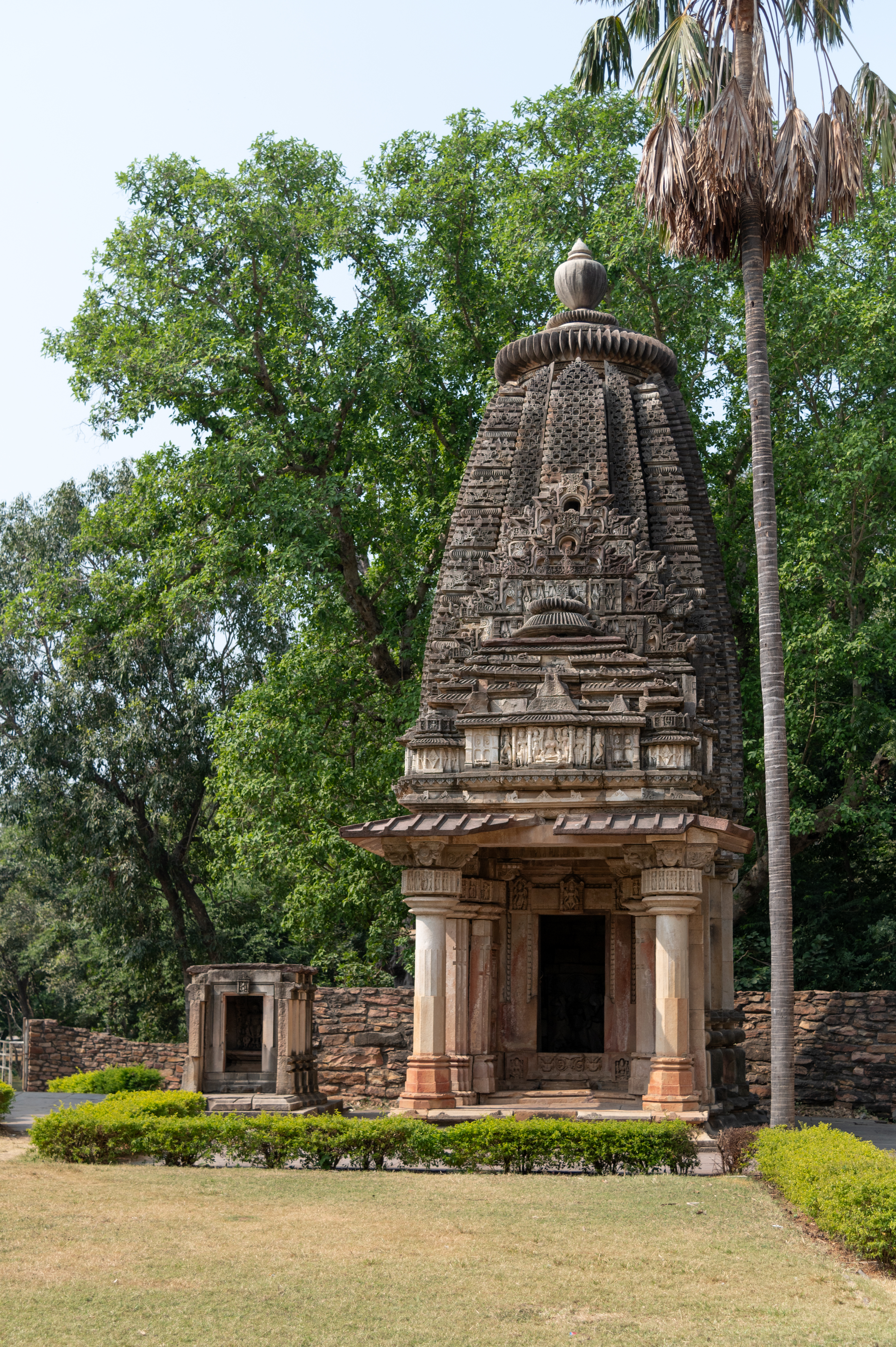 Temple 6 is dedicated to Mahishasuramardini. The temple is situated next to the Vamana Temple and to the right side of the Ghateshwar Temple. It is one of the well-preserved temples and biggest temples in the complex, with all its parts intact. The temple is east-facing and consists of a mukhamandapa (front porch), antarala (vestibule), and a garbhagriha (sanctum sanctorum).