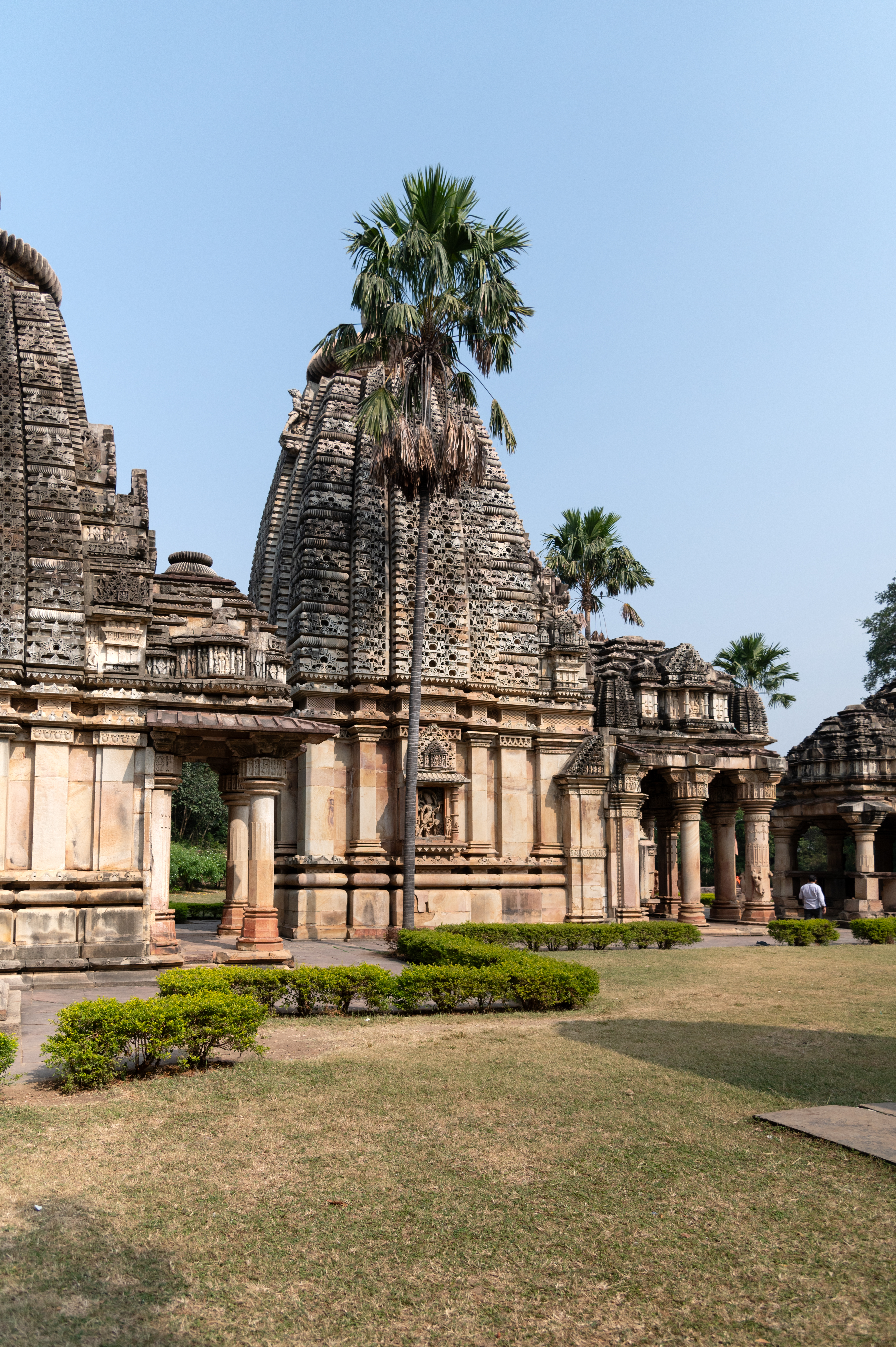 The pancharatha garbhagriha (sanctum with five offset projections) of the Ghateshwar Temple stands on a vedibandha (basal moulding) comprising a khura, kumbha (pot), kalasha (a pitcher), antarapata (recesses between moulding) and kapotapalika (cyma eve cornice). The jangha (wall) above has a bhadra (central offset), pratibhadra (offset flanking bhadra) and karna (corner offset). The bhadra has a niche installed with the figure of Andhakasuravadha. The pratiratha and karna are plain pilasters. The varandika (moulded parapet) above the jangha displays a checkered band between two kapotapalikas. The shikhara (superstructure) of the garbhagriha (sanctum sanctorum) is of the latina (vertical mono-spire) type.