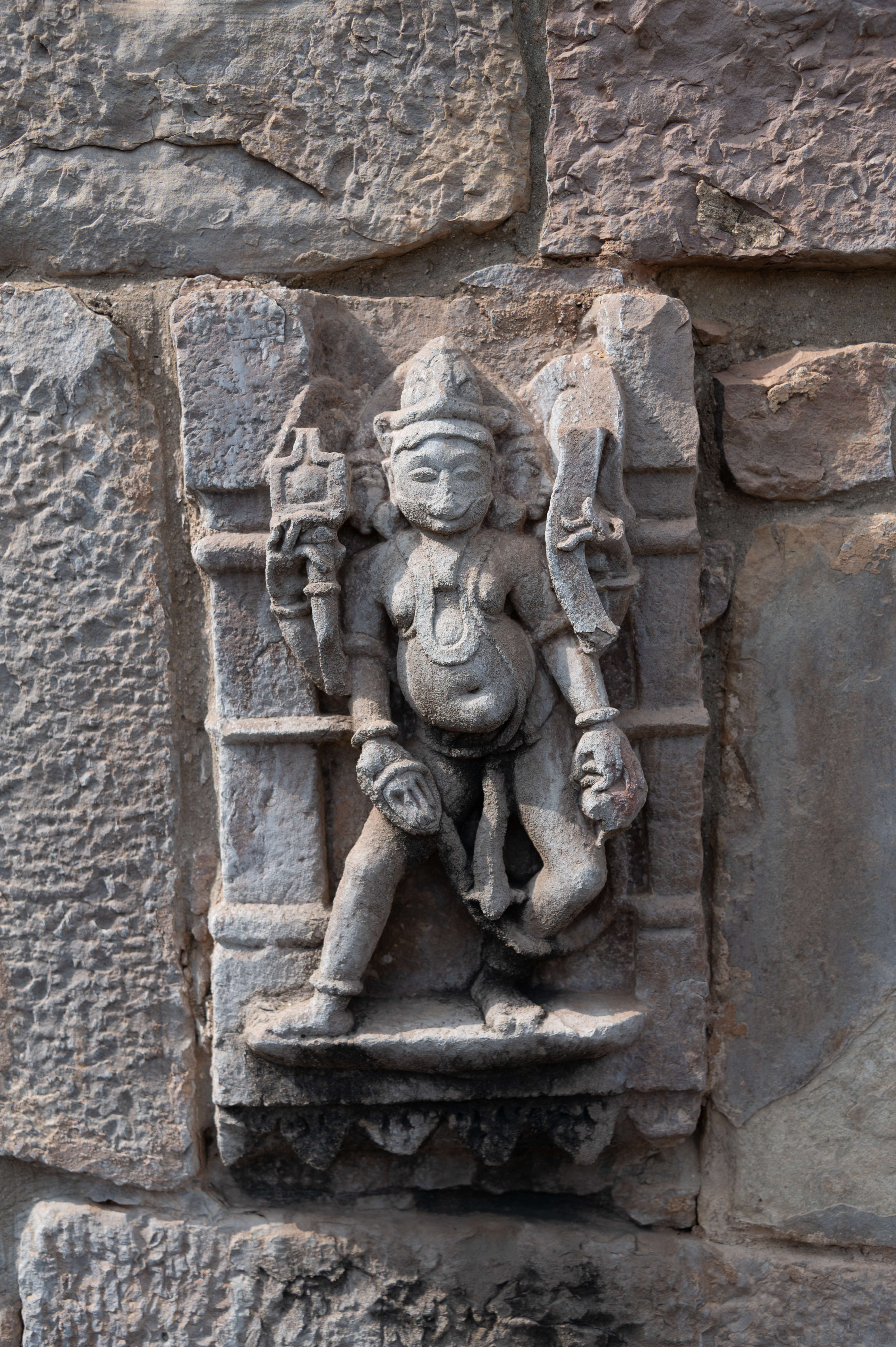 Image 10: The three-faced Brahma wears a jatamukuta (crown of matted hair) and carries a shruka (sacrificial ladle) and putaka (water vessel) in the upper arms, along with a kamandalu (water pot) and akshamala (rosary) in the lower arms.