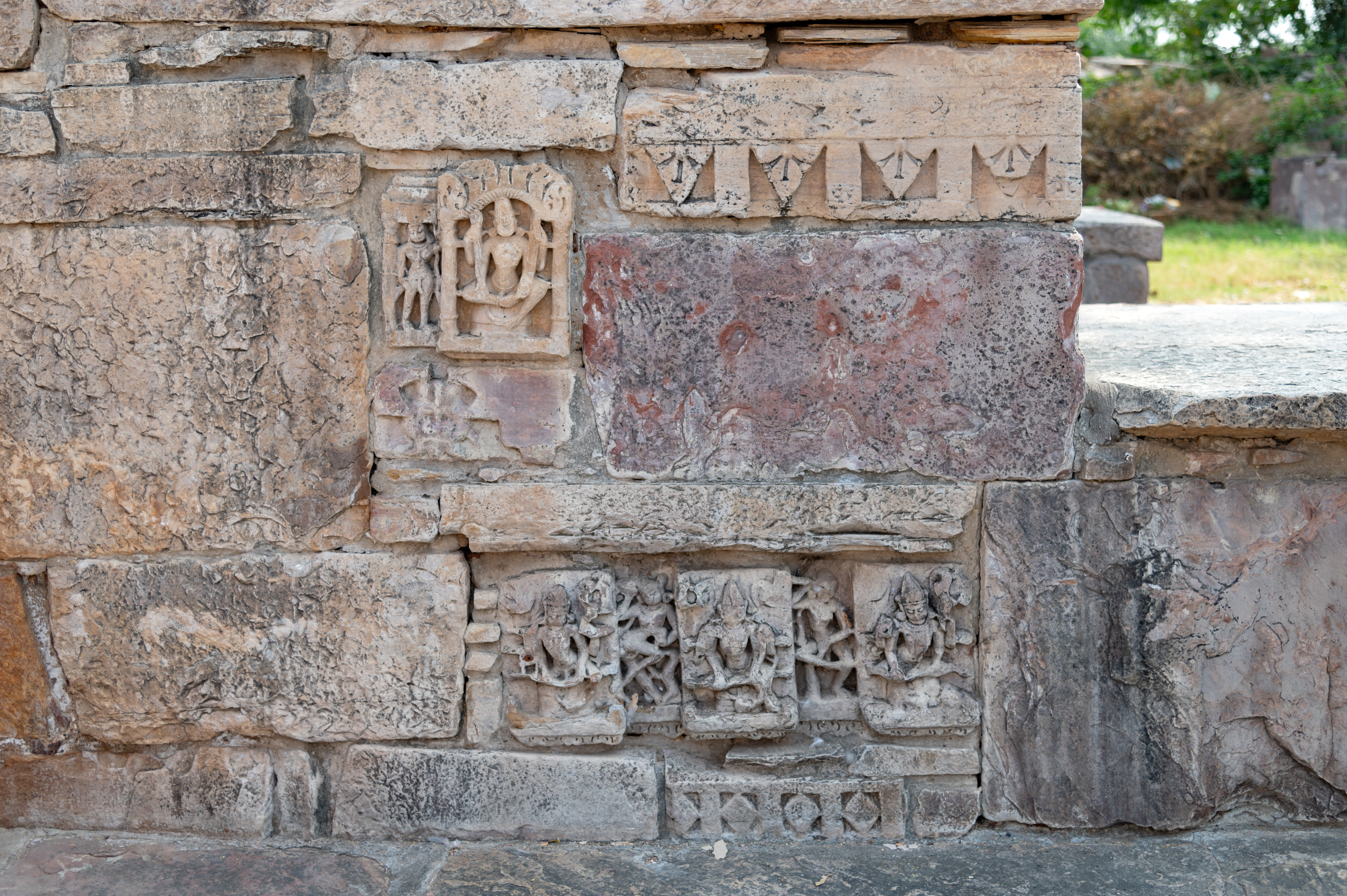 Image 16: The varying sizes and stylistic differences in these sculptures, added on the walls of the Mandakini Kund, further suggest they were not originally part of the kund.