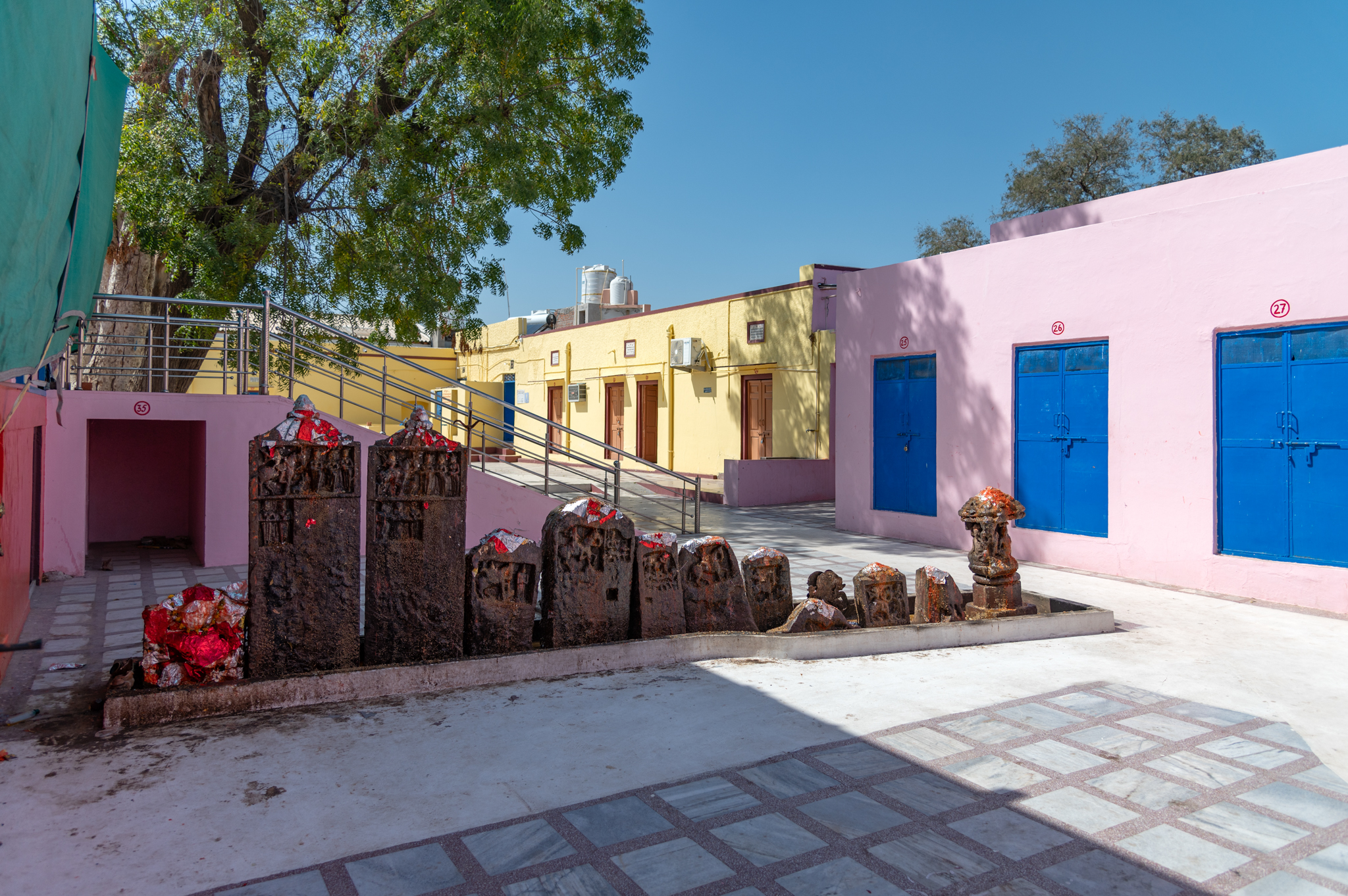 There are a dozen architectural fragments, mainly consisting of hero stones (memorial stones), along with some pillar and sculptural fragments. The hero stones were installed here after being found scattered in the temple premises and the vicinity of the village. Today, these are propitiated as ‘veeron ke pathar’, depicting the journey of the hero (veer) through different panels, in whose memory the steles were installed.