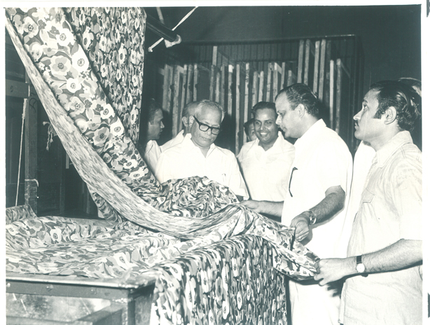 Shri Dhirubhai Ambani showing Naroda's fabric printing machinery