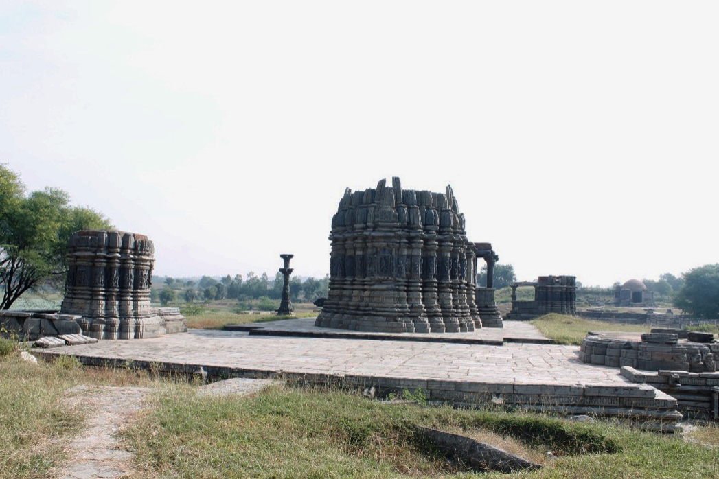 Image 4: View of the Someshwar Mahadev Temple from the western side, with the Gamela Talava situated to its north. The Kumbheshwar Mahadev Temple is faintly discernible in the background.
