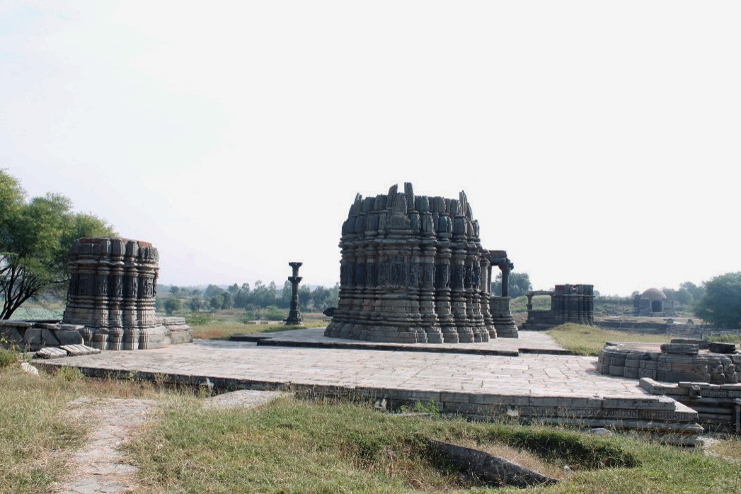 Image 4: A view of the Someshwar Mahadev Temple from the western side, with the Gamela Talav situated to the north. The Kumbheshwar Mahadev Temple is faintly discernible in the background.