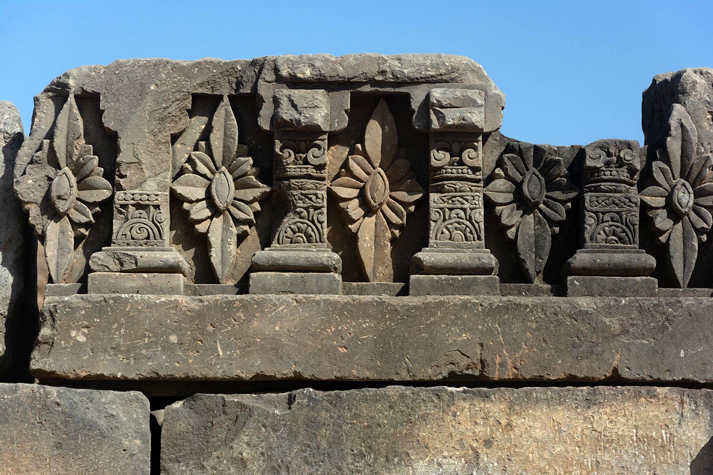 All around the adhisthana are relief carvings of geometric floriated patterns.